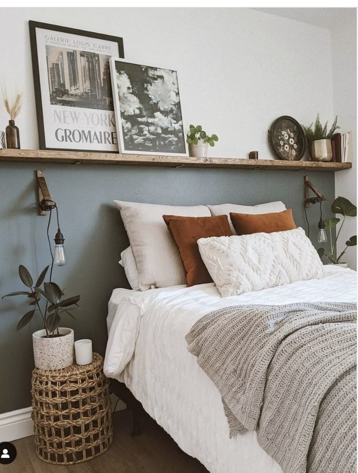 how high to hang floating shelves over your bed?