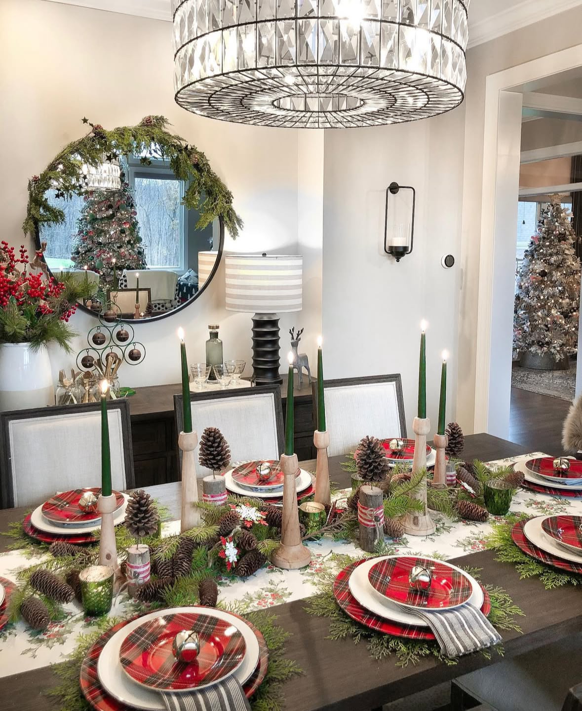 Tartan place settings and cedar garland—heritage dining room Christmas decor ideas.